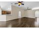 Open-concept living room with view of kitchen and high ceilings at 2499 Trimble Ave, North Port, FL 34288