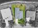 Overhead view of a beautiful home with a large yard and lake access at 2808 124Th E Ave, Parrish, FL 34219