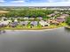 Aerial view of a neighborhood situated on a waterfront with lush green landscaping at 2808 124Th E Ave, Parrish, FL 34219