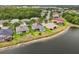 Aerial shot showcasing a home near a tranquil lake and lush greenery at 2808 124Th E Ave, Parrish, FL 34219