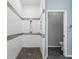 Beautiful tiled walk-in shower with stone flooring and a separate toilet room at 2808 124Th E Ave, Parrish, FL 34219