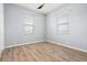 Bright bedroom with hardwood floors and windows to provide natural light at 2808 124Th E Ave, Parrish, FL 34219