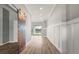 Bright foyer with natural light, decorative wood door and views to the lanai at 2808 124Th E Ave, Parrish, FL 34219