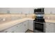 Well-equipped kitchen boasts sleek appliances, ample counter space, and modern cabinetry at 2808 124Th E Ave, Parrish, FL 34219