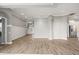 Open-concept living space with modern flooring, recessed lighting, and neutral paint palette at 2808 124Th E Ave, Parrish, FL 34219