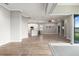 Bright living area with easy access to the kitchen and an outdoor patio at 2808 124Th E Ave, Parrish, FL 34219