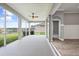 Spacious screened lanai with a view of the pond, providing a relaxing outdoor living space at 2808 124Th E Ave, Parrish, FL 34219