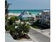 Scenic aerial view showcasing charming beach homes with ocean views and a vibrant coastal community at 2809 Avenue E, Holmes Beach, FL 34217