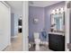 Cozy bathroom with vanity, granite countertop, and unique decor at 3430 77Th W St # 103, Bradenton, FL 34209