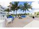 Outdoor deck with comfortable seating and a fire pit, perfect for relaxing in the community at 3430 77Th W St # 103, Bradenton, FL 34209