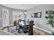 Elegant dining area with a modern chandelier and large window, great for entertaining guests at 3430 77Th W St # 103, Bradenton, FL 34209
