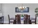 Dining room featuring a modern light fixture and stylish decor at 3430 77Th W St # 103, Bradenton, FL 34209