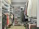 Organized walk-in closet with shelves, rods, and ample storage space for clothes and accessories at 3430 77Th W St # 103, Bradenton, FL 34209