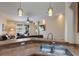 Open-concept kitchen view overlooking the living area and outdoor patio at 4119 101St E Ave, Parrish, FL 34219