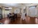 Bright living space with an archway and hardwood flooring at 4119 101St E Ave, Parrish, FL 34219