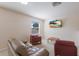 Comfortable living room with plush seating, television and a tranquil outdoor view at 4119 101St E Ave, Parrish, FL 34219