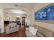 Spacious living room featuring neutral walls, hardwood floors, and an archway at 4119 101St E Ave, Parrish, FL 34219