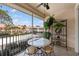 Relax on the balcony with a ceiling fan, plants and great views of the neighborhood at 4244 Central Sarasota Pkwy # 726, Sarasota, FL 34238