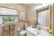 Updated bathroom features a single sink vanity and tiled shower at 4244 Central Sarasota Pkwy # 726, Sarasota, FL 34238