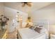 Sun-filled bedroom with elegant decor, leading to a modern bathroom and stylish furnishings at 4244 Central Sarasota Pkwy # 726, Sarasota, FL 34238