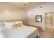 Bright bedroom features a cozy, inviting bed with neutral tones and a convenient closet at 4244 Central Sarasota Pkwy # 726, Sarasota, FL 34238