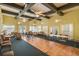 Large community room with ample seating and large ceiling fans at 4244 Central Sarasota Pkwy # 726, Sarasota, FL 34238