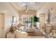 Spacious living room with vaulted ceilings and sliding glass doors to the lanai at 4244 Central Sarasota Pkwy # 726, Sarasota, FL 34238