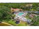 Community pool features a large in-ground pool, spa, and tennis court for relaxing resort-style living at 4244 Central Sarasota Pkwy # 726, Sarasota, FL 34238