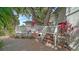 Brick steps leading to deck overlooking the backyard and landscaping at 4514 Trails Dr, Sarasota, FL 34232