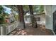 Wide deck featuring views of the house and trees at 4514 Trails Dr, Sarasota, FL 34232