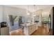Open-concept kitchen with a large island, stainless steel appliances, and easy access to the dining area at 4514 Trails Dr, Sarasota, FL 34232