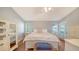 This main bedroom features hardwood floors, neutral colors, and bright windows at 4514 Trails Dr, Sarasota, FL 34232