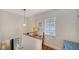 Cozy office nook with desk, chair, natural light, and hardwood floors at 4514 Trails Dr, Sarasota, FL 34232