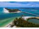 Stunning aerial view featuring a bridge over turquoise waters, pristine beaches, and lush green landscapes at 4745 Independence Dr # 4745, Bradenton, FL 34210