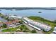 Aerial view of condos with bay in background showcases property's desirable waterfront setting at 4745 Independence Dr # 4745, Bradenton, FL 34210