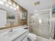 Bathroom featuring a glass door shower at 4745 Independence Dr # 4745, Bradenton, FL 34210