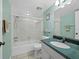 Guest bathroom featuring a shower over bath at 4745 Independence Dr # 4745, Bradenton, FL 34210