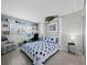 Guest bedroom featuring a murphy bed at 4745 Independence Dr # 4745, Bradenton, FL 34210
