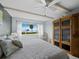 Primary bedroom with a water view and custom wood cabinet at 4745 Independence Dr # 4745, Bradenton, FL 34210