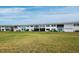 Beautiful condominium exterior surrounded by green lawns at 4745 Independence Dr # 4745, Bradenton, FL 34210