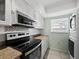 Bright updated kitchen featuring stainless steel appliances at 4745 Independence Dr # 4745, Bradenton, FL 34210