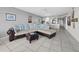 Comfortable living room with sectional sofa and open view to the kitchen at 4745 Independence Dr # 4745, Bradenton, FL 34210