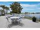 Outdoor patio with seating area and view of lake at 4745 Independence Dr # 4745, Bradenton, FL 34210