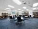 Bright recreation room with bookshelves and chairs, perfect for reading at 4745 Independence Dr # 4745, Bradenton, FL 34210