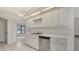 Bright kitchen featuring white cabinets and ample counter space at 5004 32Nd E St, Bradenton, FL 34203
