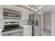 Well-lit kitchen with stainless steel appliances and white cabinetry at 5004 32Nd E St, Bradenton, FL 34203