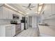 Efficient kitchen featuring white cabinets and stainless appliances at 5004 32Nd E St, Bradenton, FL 34203