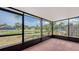 Screened-in lanai provides peaceful pond views and outdoor living at 5004 32Nd E St, Bradenton, FL 34203