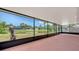 Enclosed lanai features a view of the pond and backyard at 5004 32Nd E St, Bradenton, FL 34203