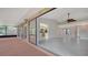 Open-concept living space flows to lanai and features a ceiling fan at 5004 32Nd E St, Bradenton, FL 34203